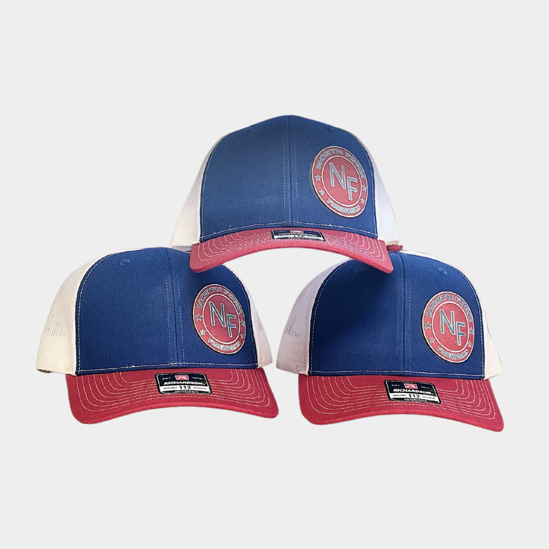 pile of blue hats with red brims and company logo