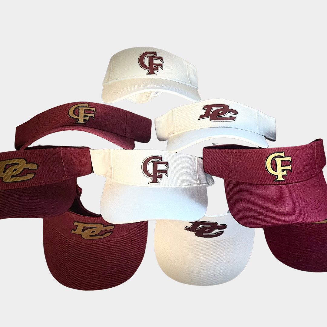 a pile of red and white visors with logos