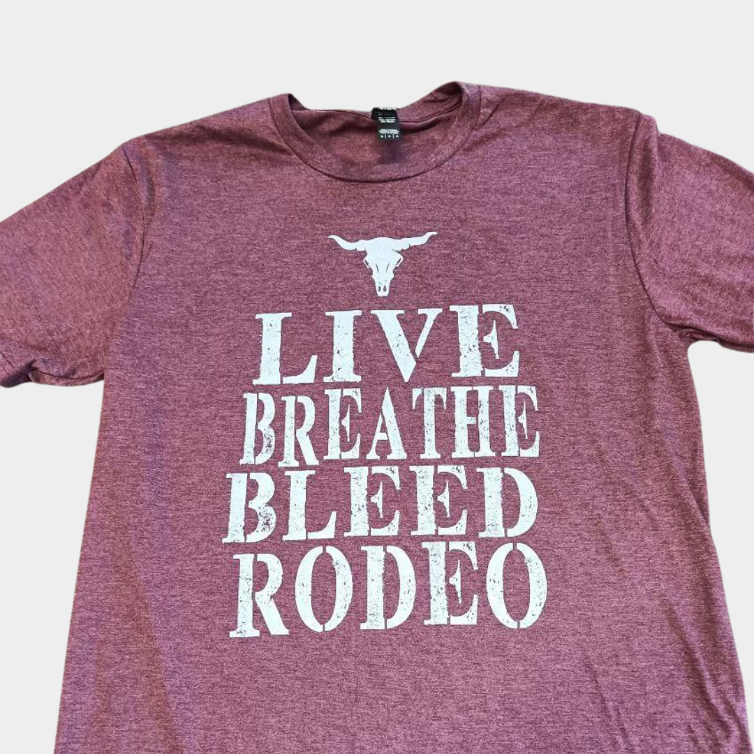 a red shirt with a white steer skull logo and white lettering that says "LIVE BREATHE BLEED RODEO"