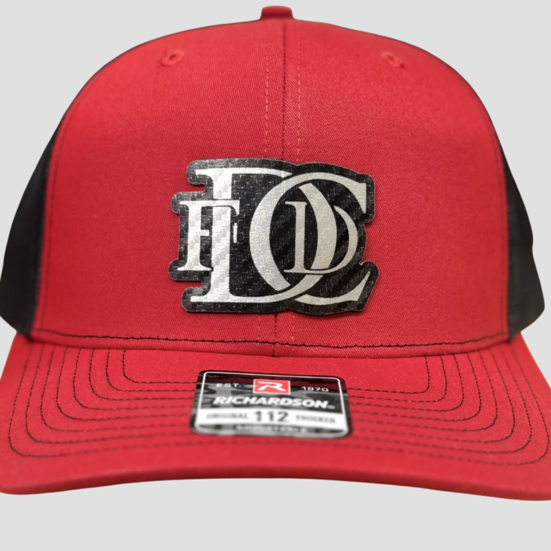 a red ball cap with sports team logo