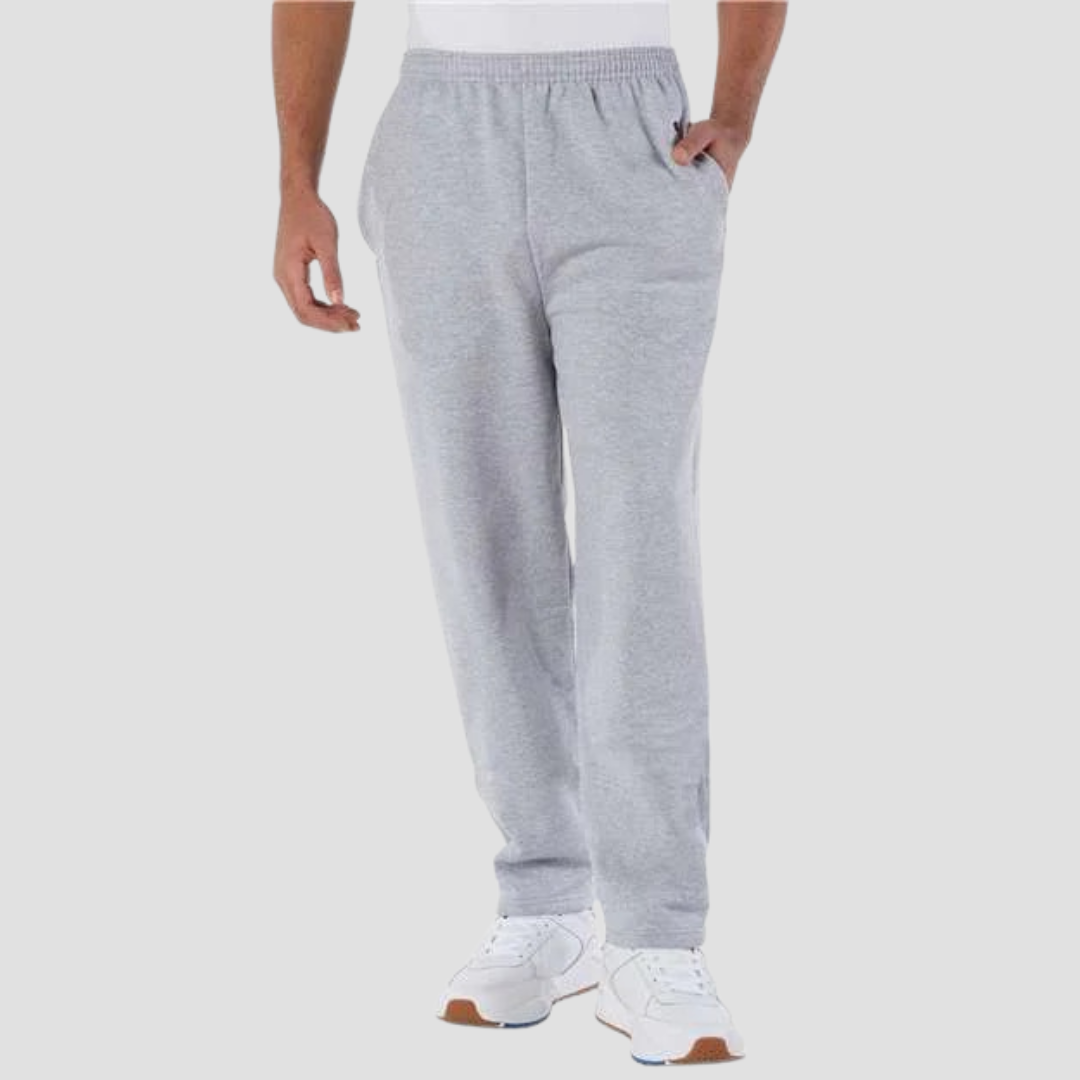 bottom half of a male in grey sweatpants