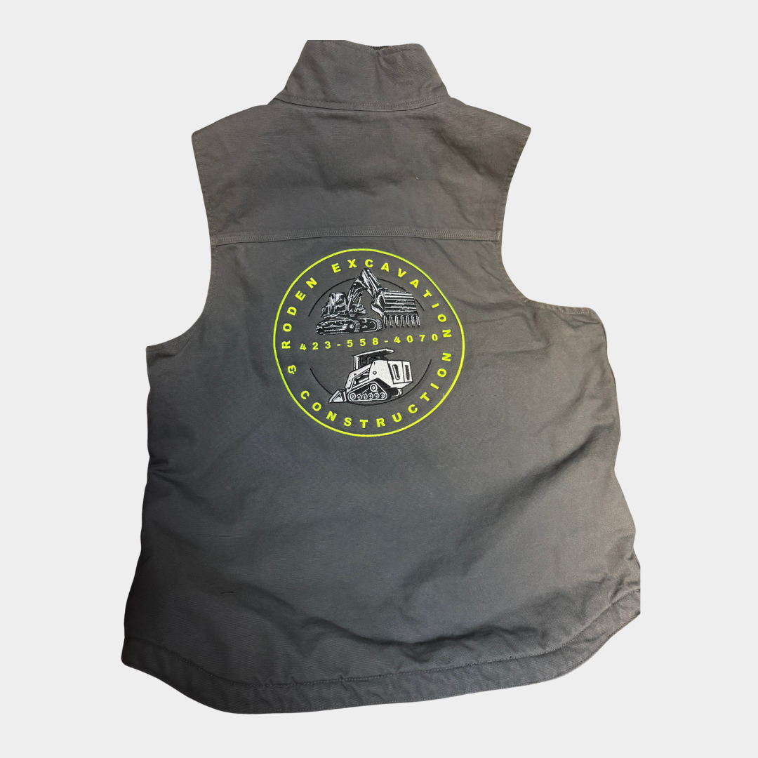 grey vest with green logo for Roden Excavation and Construction